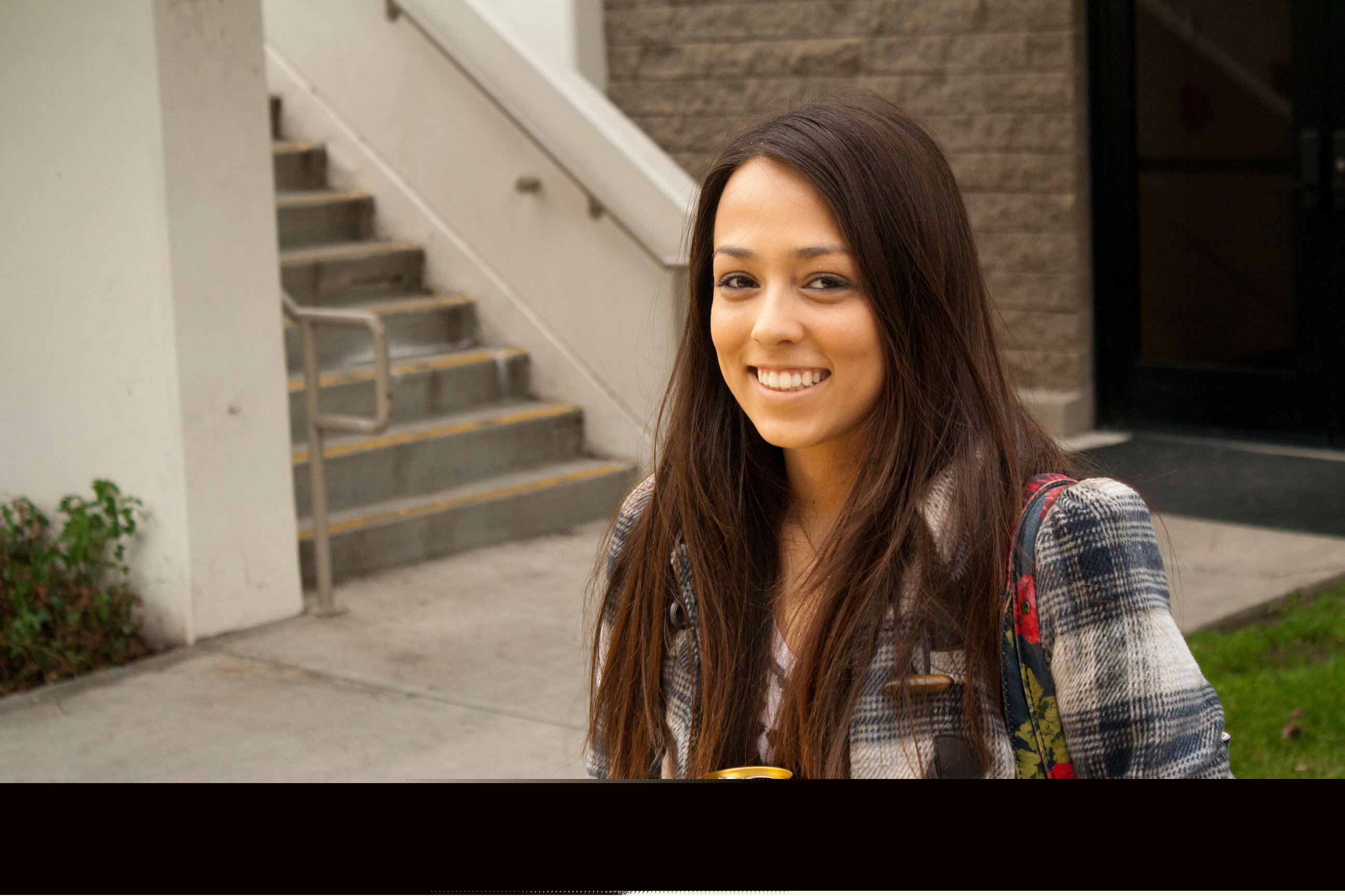Outdoor portrait of a smiling woman